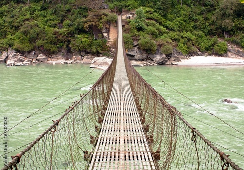 rope hanging suspension bridge in Nepal photo