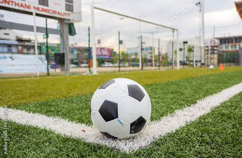 Soccer football in goal net © issrar