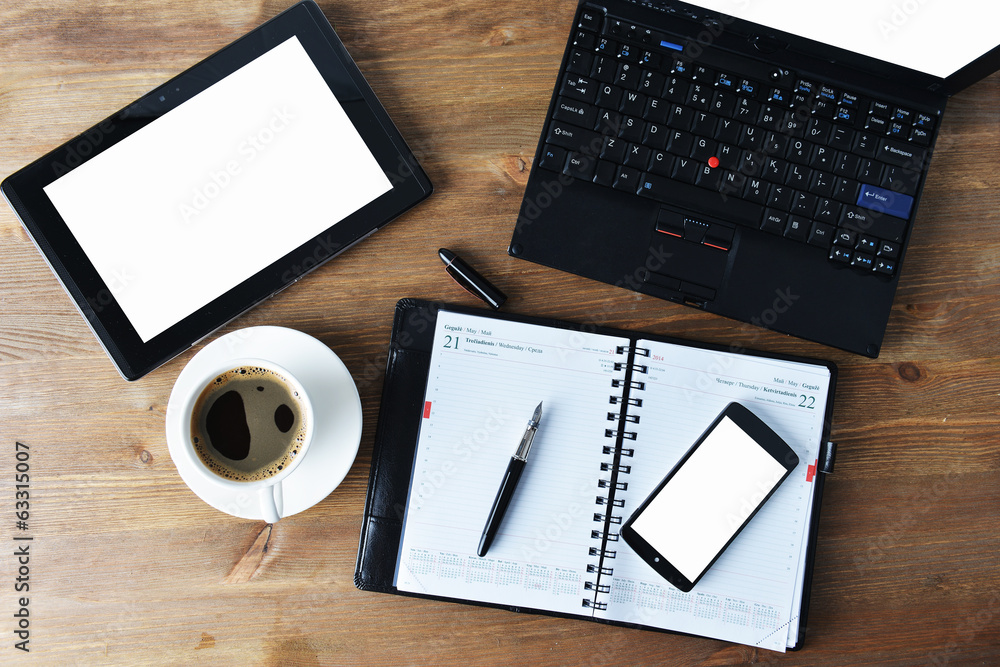 notebook and cup of coffee notebook and cup of coffee
