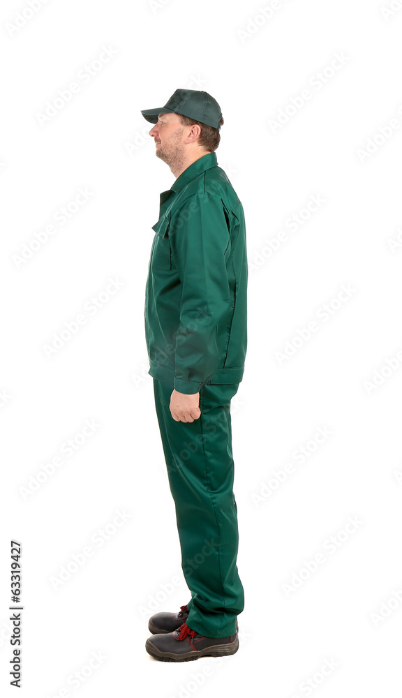 Man in green workwear. Man in green workwear.