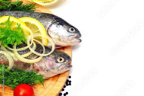 trout on a plate with vegetables