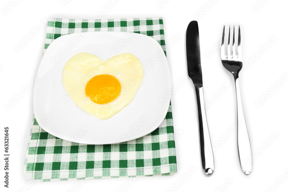 Scrambled eggs with bread on plate, on color napkin Scrambled eggs with bread on plate, on color napkin