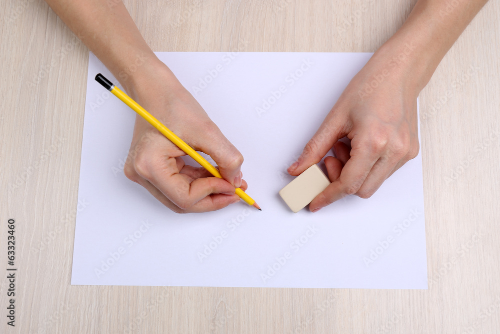Human hands with pencil writing Human hands with pencil writing