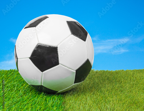 soccer ball on the field and blue sky © FrameAngel