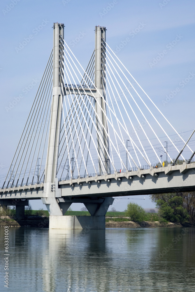 Fototapeta premium Cable-stayed bridge across river Po in Northern Italy