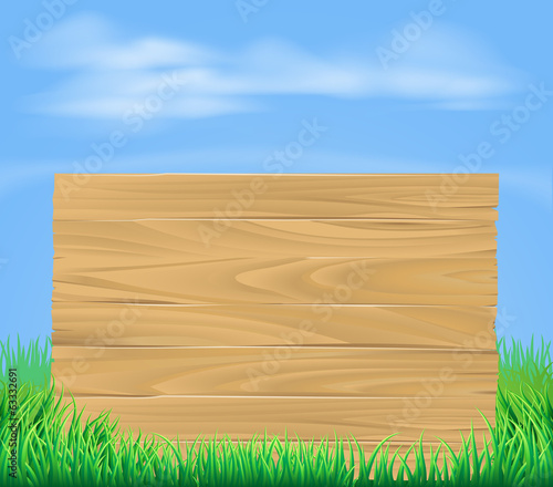 Wooden sign in field