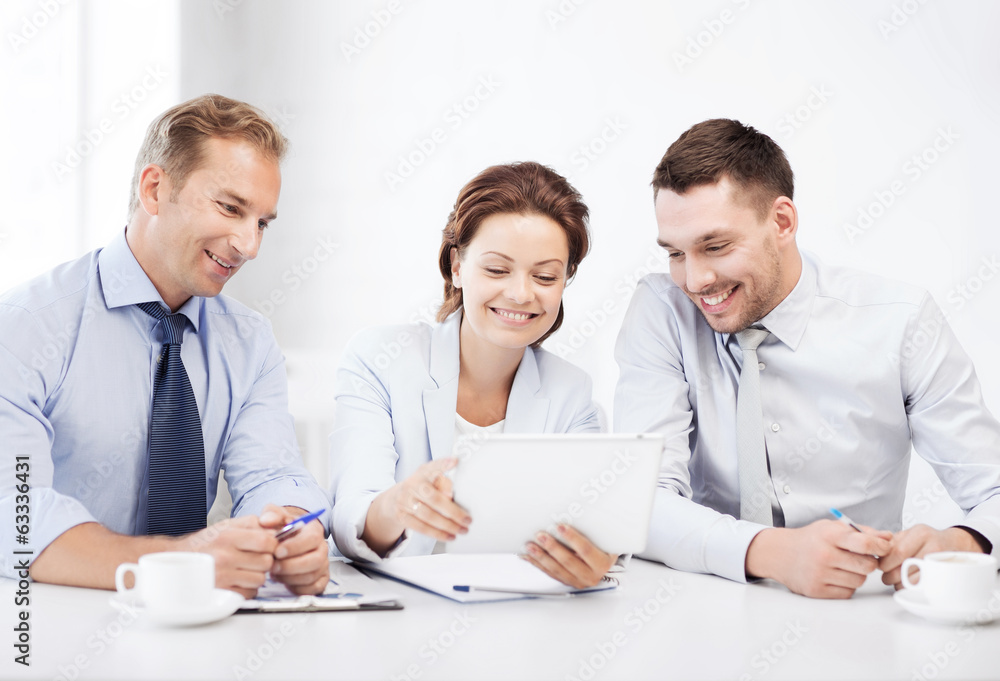 business team looking at tablet pc in office business team looking at tablet pc in office