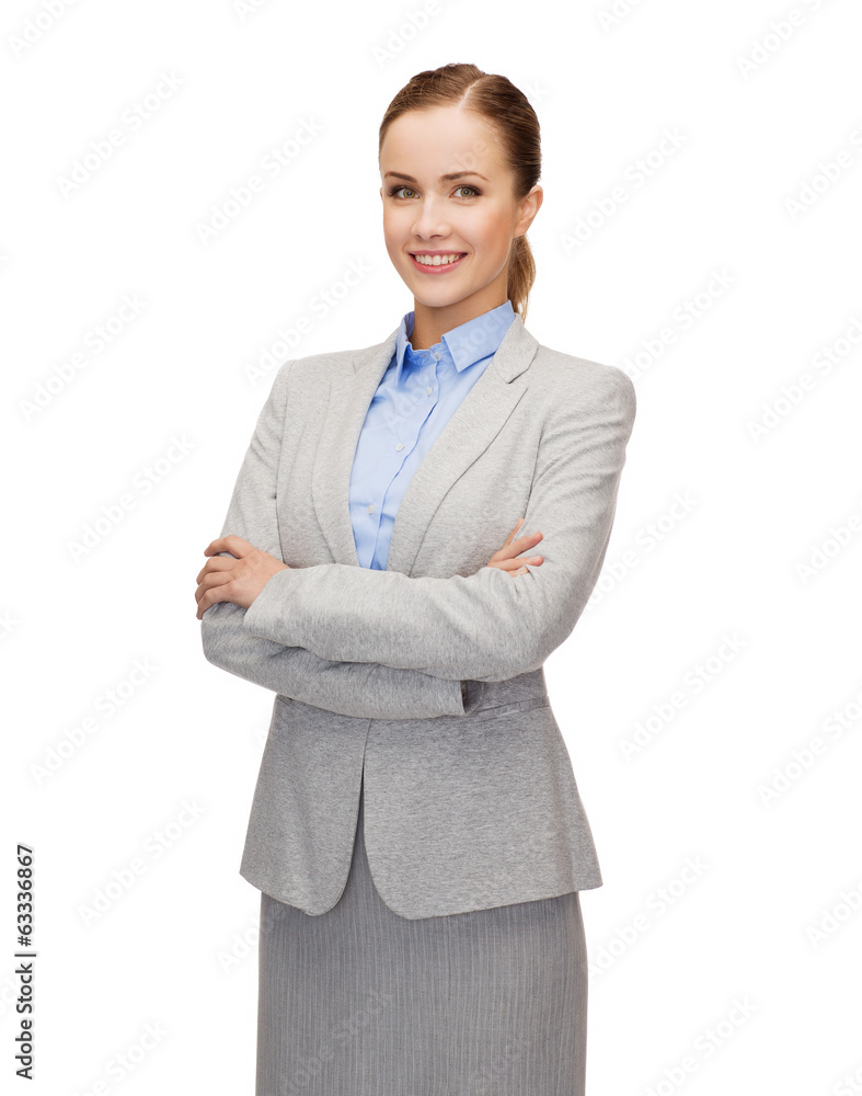 young smiling businesswoman with crossed arms young smiling businesswoman with crossed arms