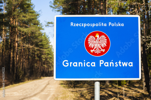 Border post with the emblem of the Poland.