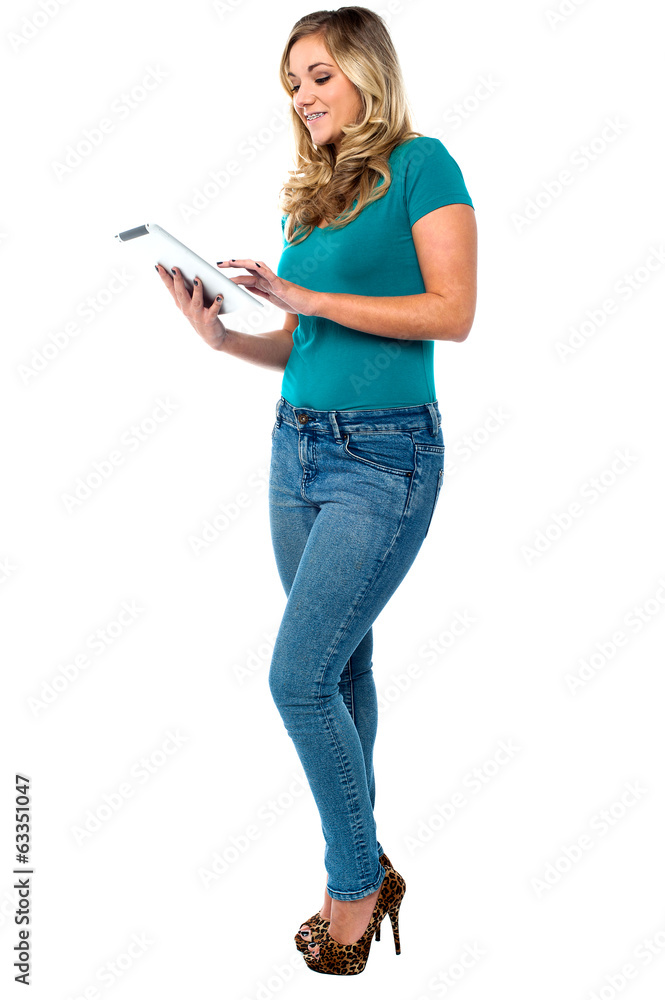 Young woman using a digital tablet Young woman using a digital tablet