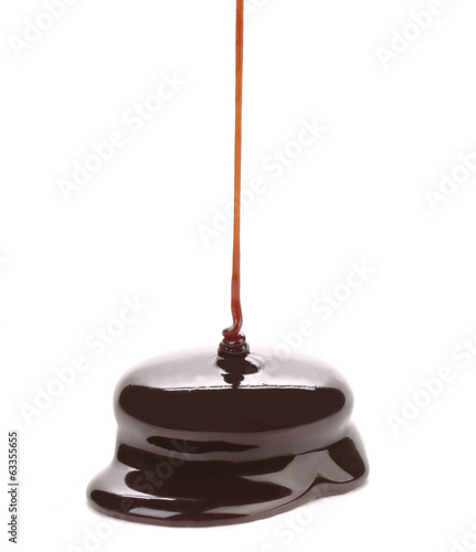Flowing dark caramel.