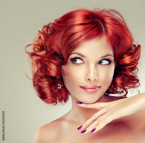 Beautiful model red with curly hair