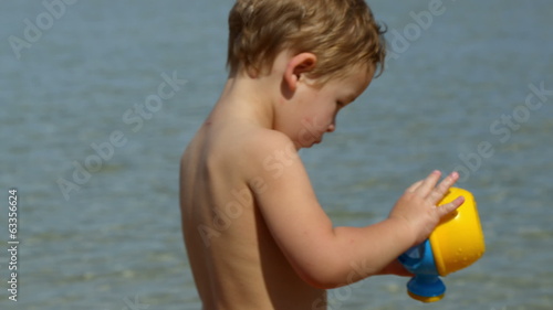 Family rest on the beach photo