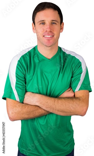 Handsome football fan in green