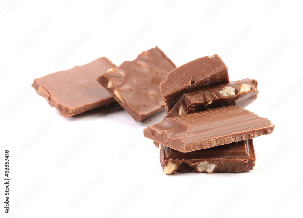 Tasty morsel of milk chocolate with nuts Tasty morsel of milk chocolate with nuts