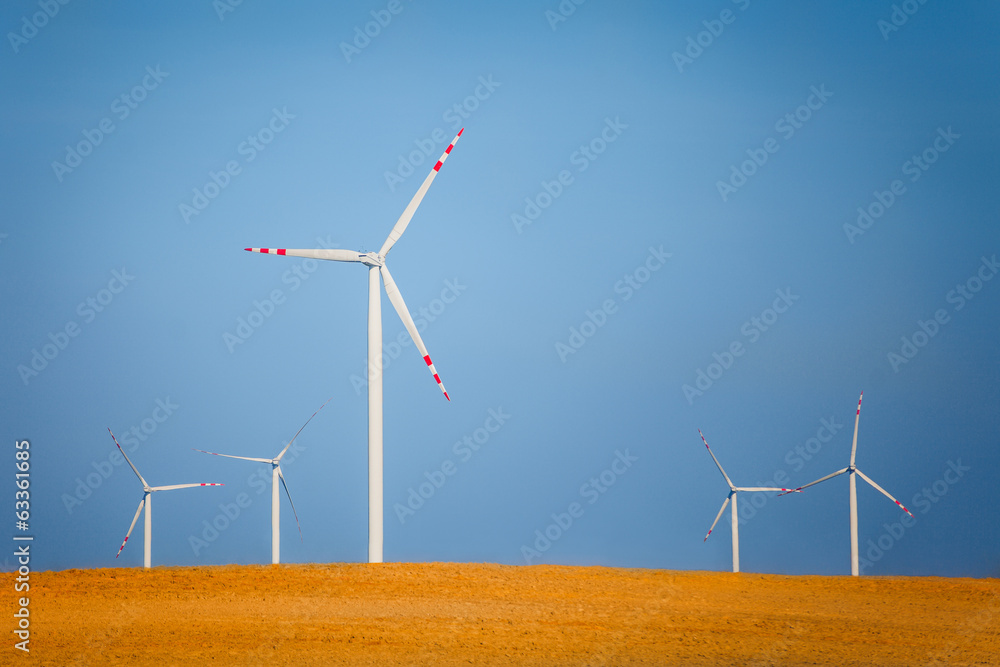 Wind turbines on a field Wind turbines on a field