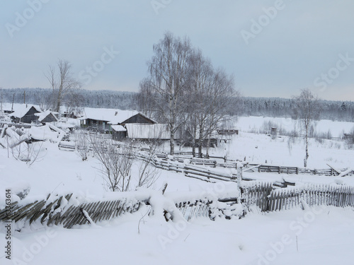 Winter in Russian village © enskanto