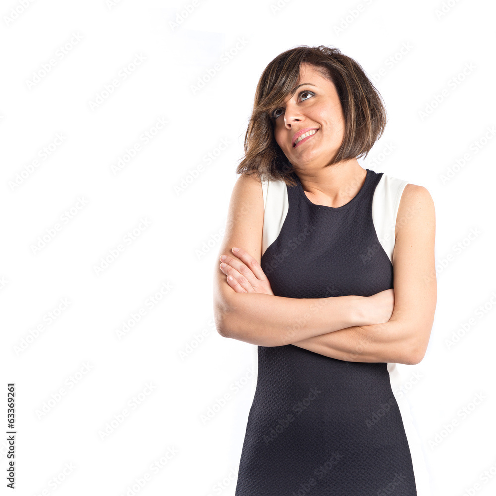 Pretty woman thinking over isolated white background Pretty woman thinking over isolated white background