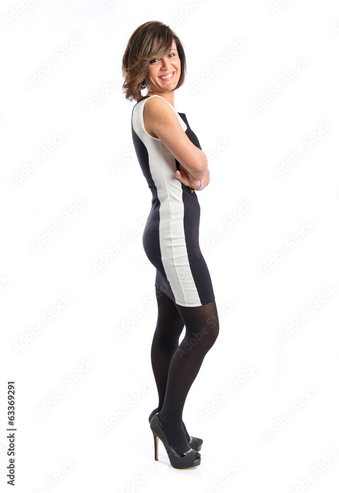 Young woman with hers arms crossed over white background Young woman with hers arms crossed over white background