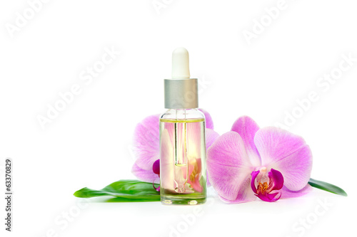 Spa setting with orchids, aromatherapy concept