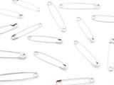 pins on a white background