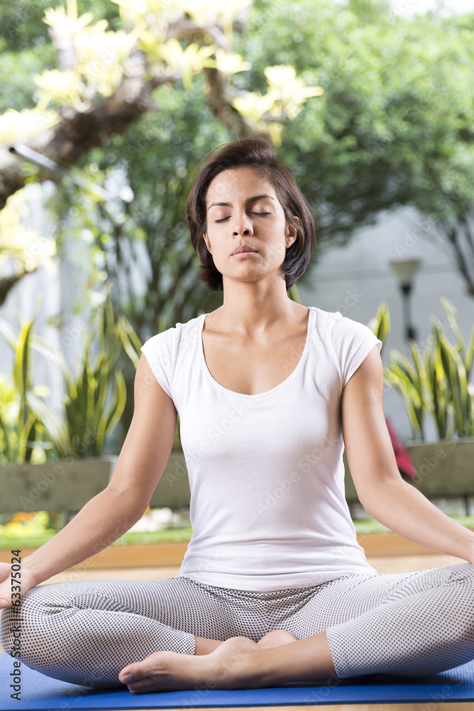 Attractive Woman Practices Yoga