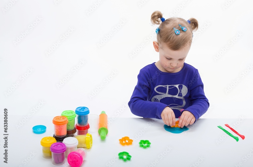 Little girl playing with play dough Little girl playing with play dough