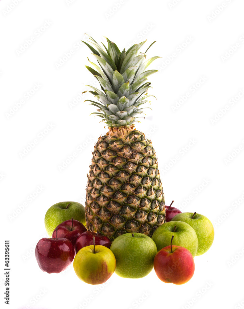 Fresh pineapple and apples on white background. Fresh pineapple and apples on white background.