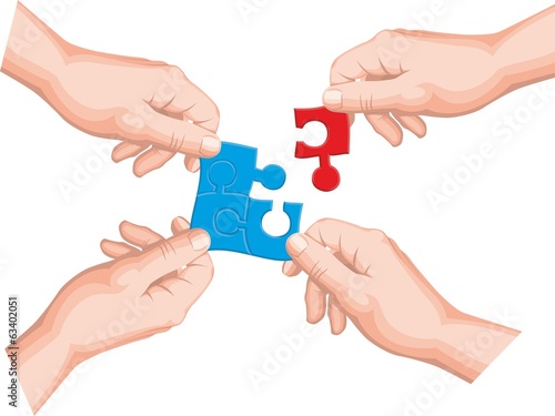Hands holding a puzzle piece