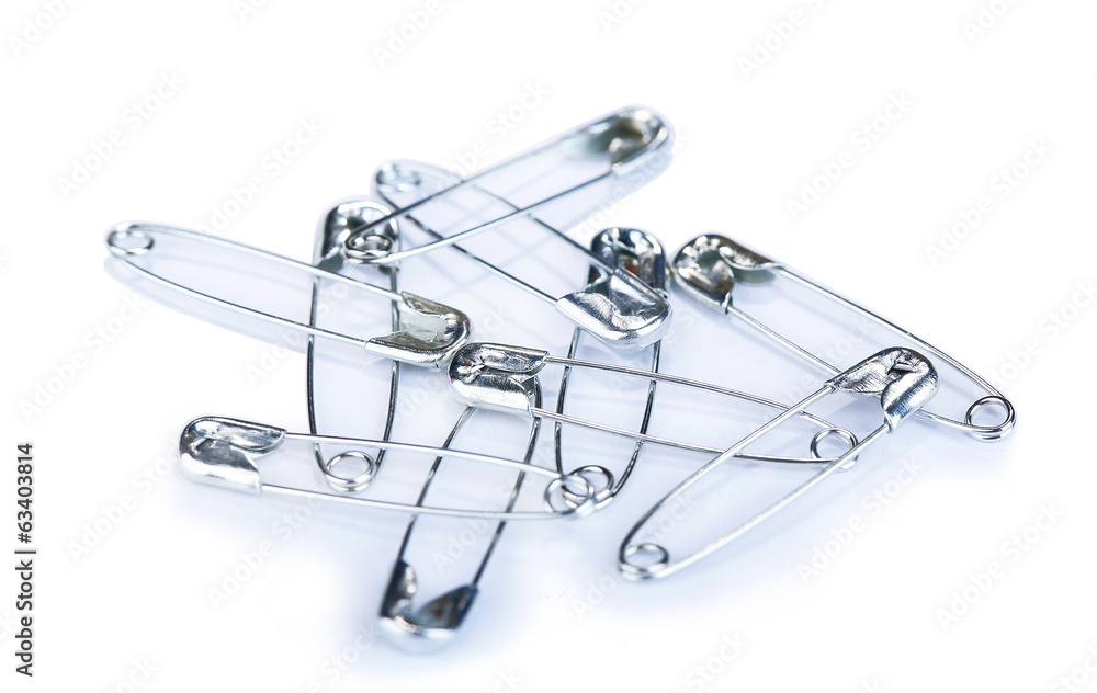 Fototapeta premium Safety pins on grey background
