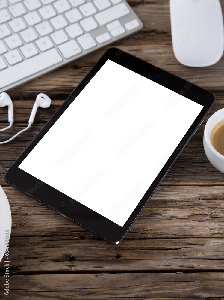 Workspace with tablet and coffee Workspace with tablet and coffee