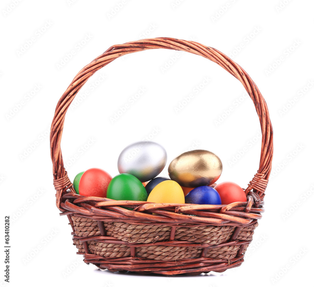 Naklejka premium Easter eggs in basket.