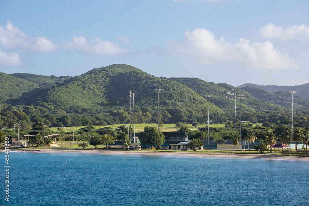 Cricket Field Between Blue Sea and Green Mountains