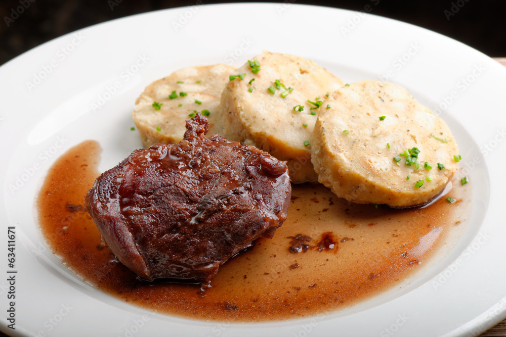 Veal fillet with rich sauce and dumplings - traditional Czech