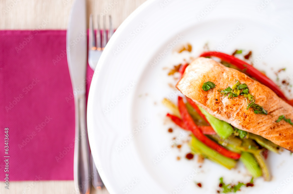 grilled smoked salmon fillet close-up with vegetables and sauce grilled smoked salmon fillet close-up with vegetables and sauce