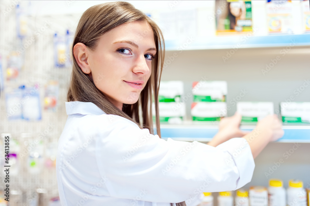 Female pharmacist presenting natural medicine