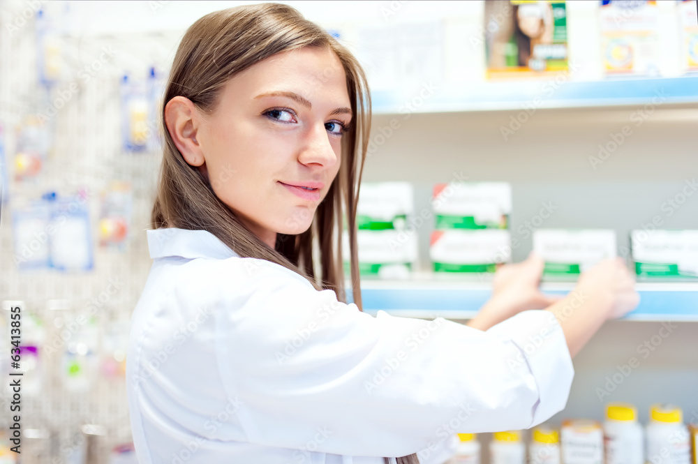 Female pharmacist presenting natural medicine Female pharmacist presenting natural medicine