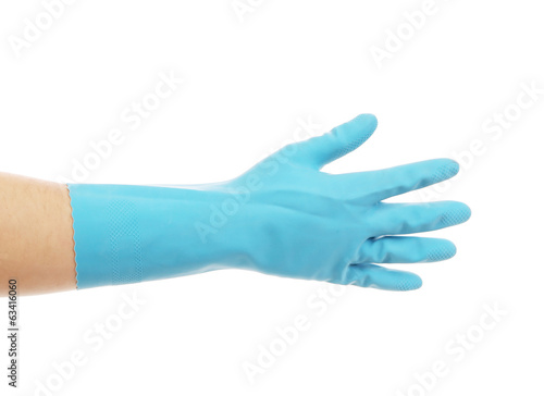 Blue latex glove on hand.