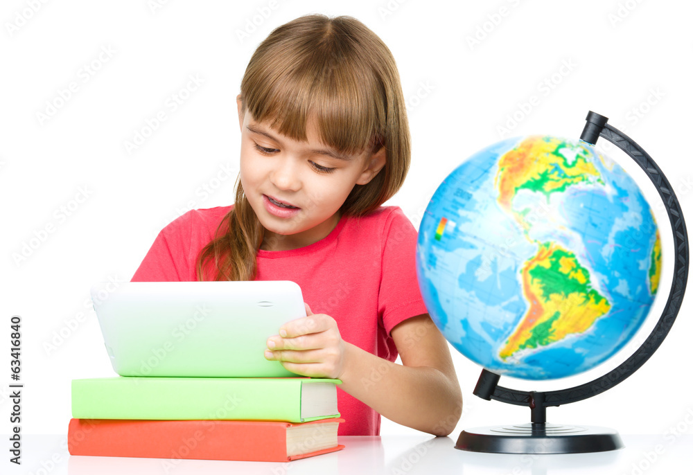 Young girl is using tablet Young girl is using tablet