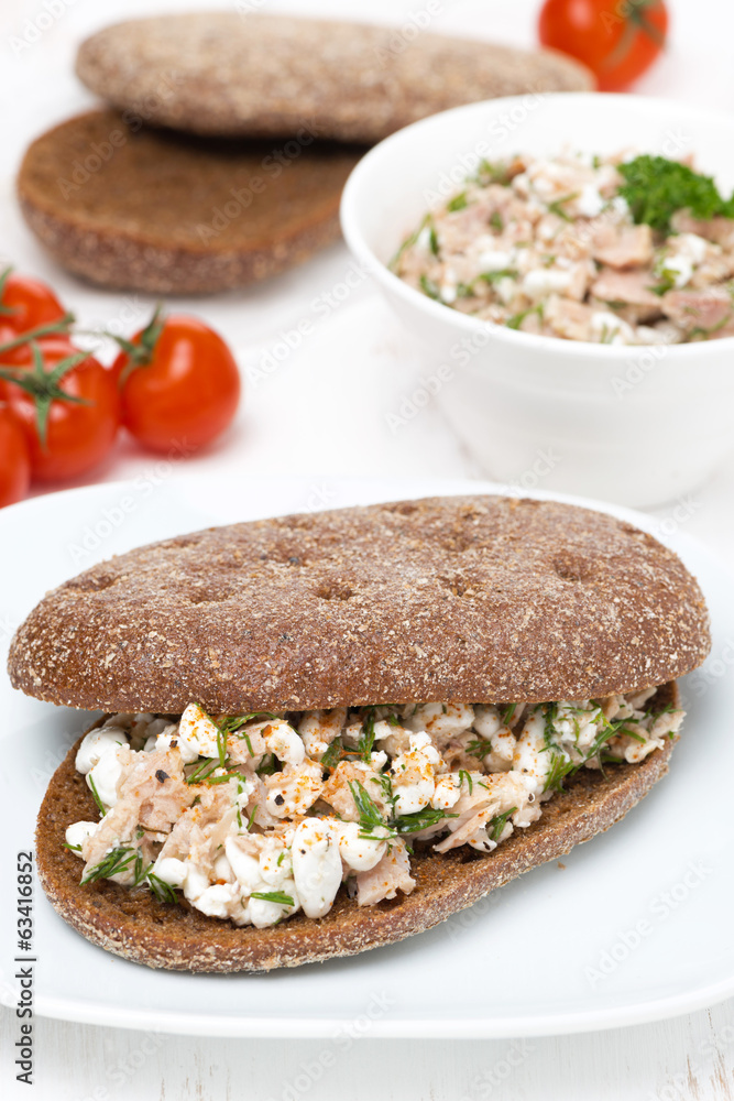 sandwich of rye bread with tuna, homemade cheese and dill sandwich of rye bread with tuna, homemade cheese and dill