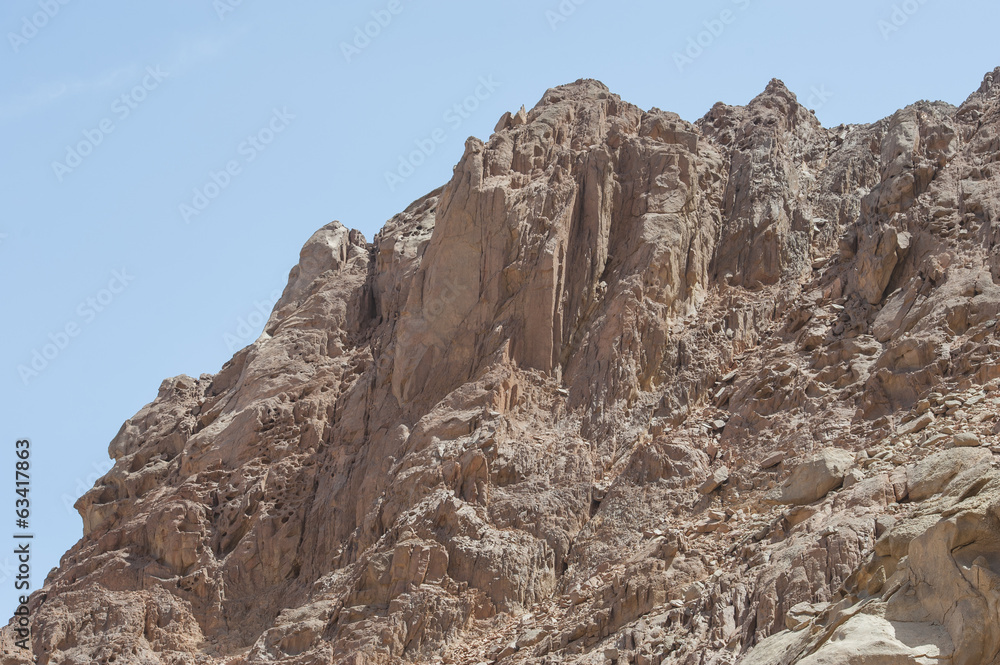 Rocky mountain slope in a desert Rocky mountain slope in a desert