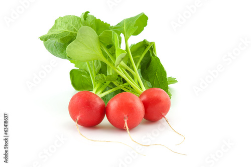 A bunch of fresh radishes on white