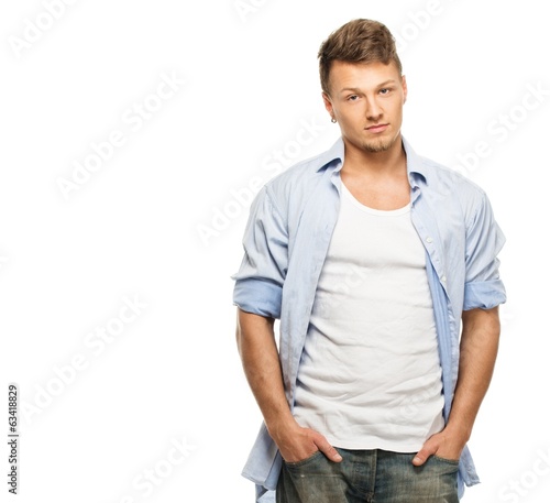 Stylish man in blue shirt and jeans 
