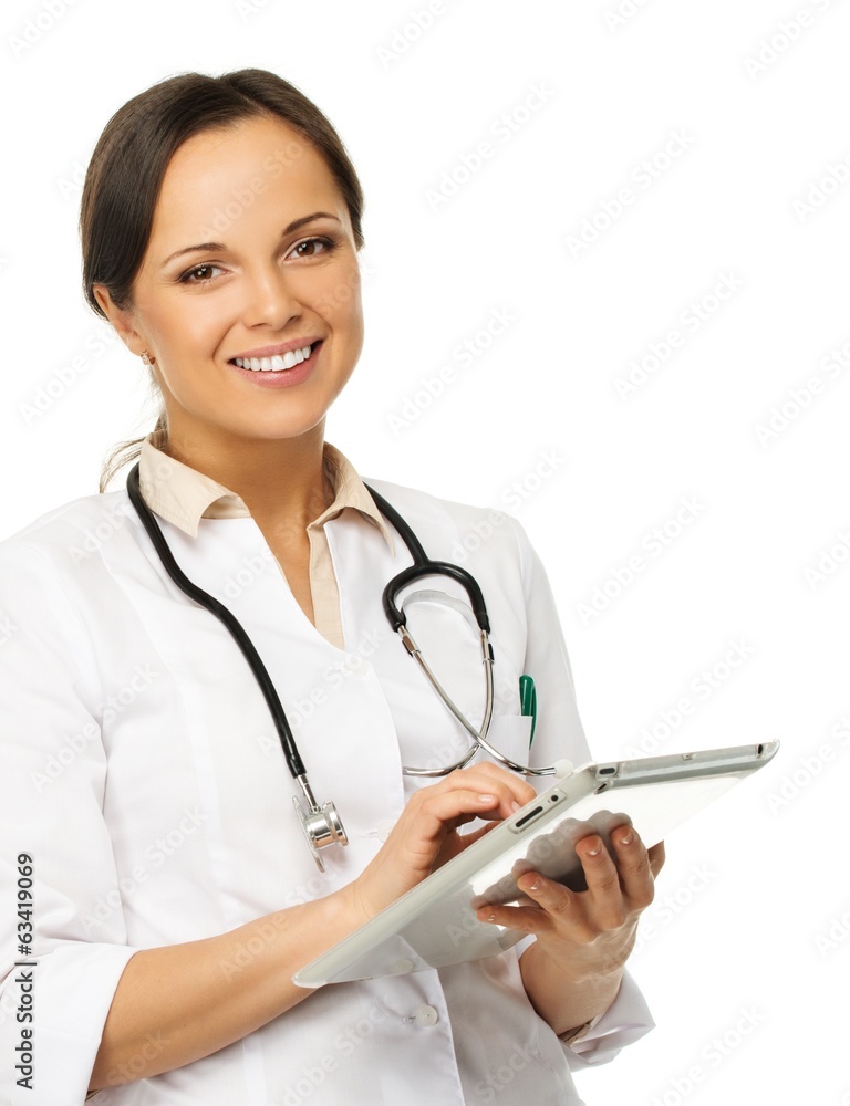 Young positive brunette doctor woman taking notes on tablet pc Young positive brunette doctor woman taking notes on tablet pc
