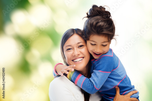 hugging mother and daughter