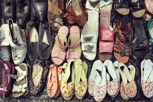 Photography Male and female used shoes at the flea market