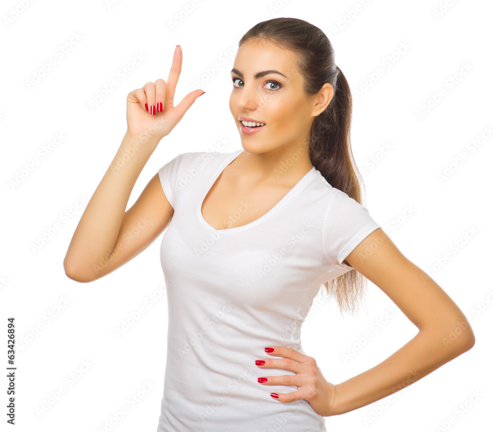 Young healthy girl shows pointing gesture Young healthy girl shows pointing gesture