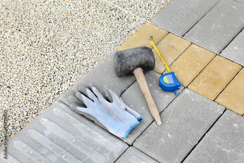 Mason tools for brick pavement installing meter, hammer, gloves