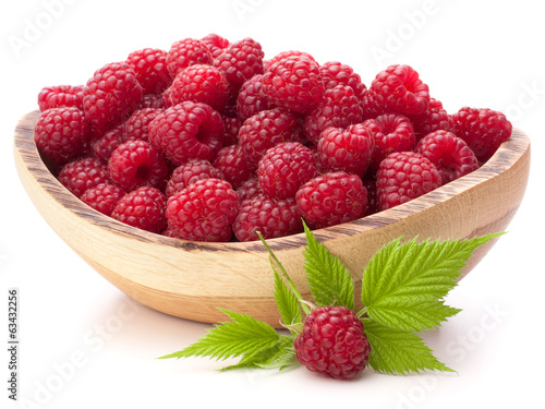 raspberries in wooden bowl