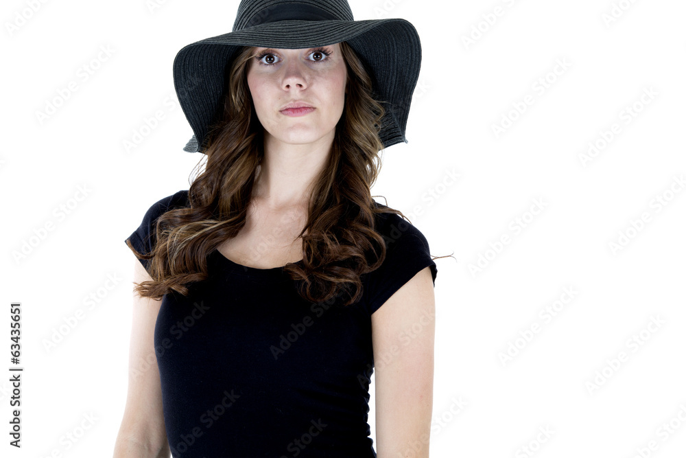 Female model with a serious expression wearing a black top Female model with a serious expression wearing a black top